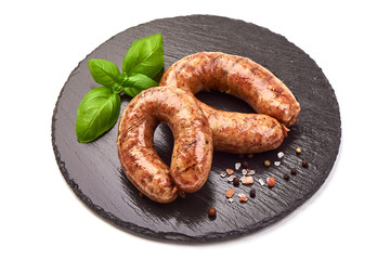 British grilled pork sausages, isolated on white background