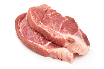 Raw pork steaks, isolated on white background