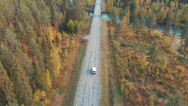 Aerial shot of camper van on scandinavian road