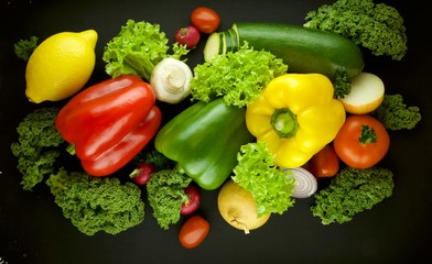 vegetables on a black background