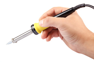 Soldering iron in a hand on a white background.
