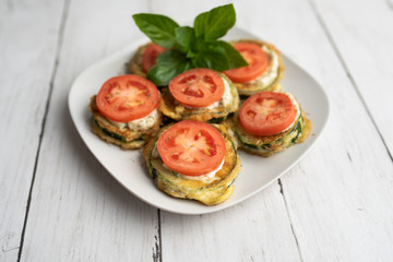 Fried zucchini with tomato dill mayonnaise and garlic sauce. Russian, European appetizer 