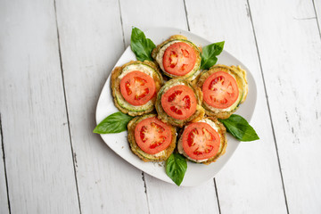 Fried zucchini with tomato dill mayonnaise and garlic sauce. Russian, European appetizer 