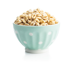 Puffed wheat covered with honey in bowl.