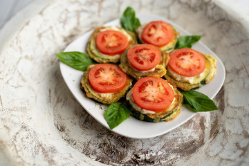 Fried zucchini with tomato dill mayonnaise and garlic sauce. Russian, European appetizer 