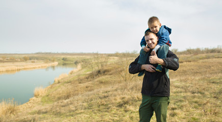 Father and son on a walk.