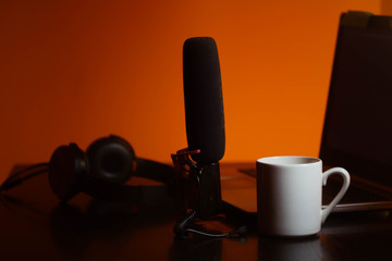 Recording podcast concept. Cup of coffee. Blogger equipment. Singing at home studio 