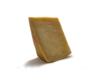 piece of French parmesan cheese on a white background isolate
