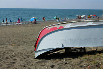 Inverted rescue boat on the beach. Lifeboat