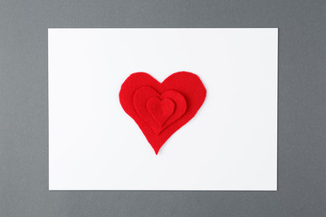 Fototapeta na wymiar Album sheet of paper with red hearts.