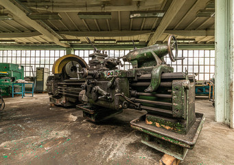 Fototapeta na wymiar Big old lathe in ironworks factory