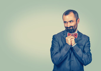 man in unpleasant situation playing nervously with hands