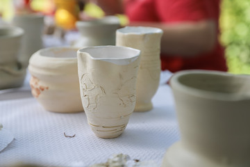 Handmade clay products: vases, pots, jars and plates