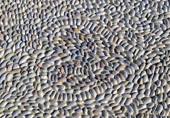  heart shape arranged from gray stones