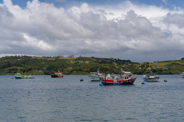 fishing boats on the river