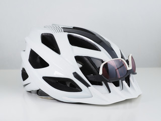 White Bicycle helmet with sunglasses.