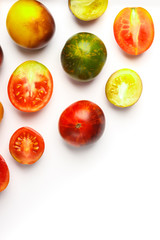 Background made from different tomatoes, white background