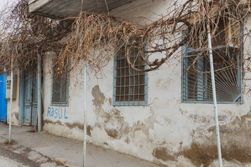 Old city with soviet streets and old houses and windows