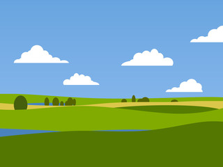 Fototapeta premium Green field on a blue sky background