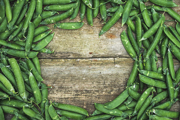 green asparagus on wooden background