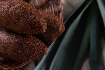 Kibe baked with cheese and ground beef. Brazilian snack