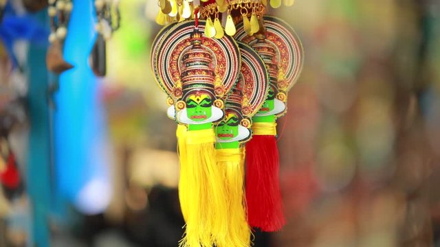 Colorful handmade souvenirs for sale in local street market in fort kochi, kerala, India. Close up