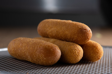 Fried sausage on the meal table. Brazilian snacks