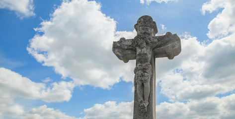 The crucifixion of Jesus Christ. Very old and ancient stone statue.
