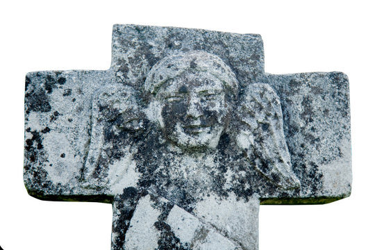 Very old and ancient stone statue of angel on cross as symbol of Christianity, death and resurrection of Jesus Christ.