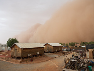 Dust storm coming over military installation