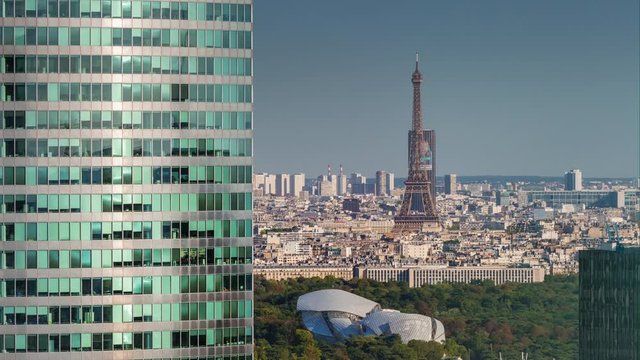sunny evening paris city famous modern downtown office building tower district rooftop timelapse panorama 4k france