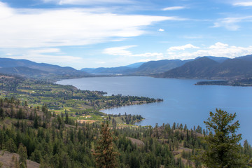 Fototapeta na wymiar A panoramic view of Okanagan Lake from the KVR trail in the mountain above Naramata