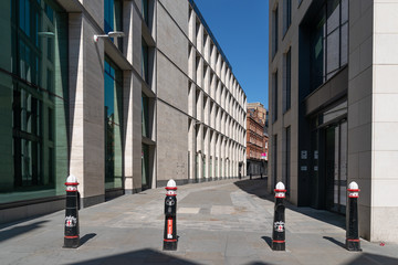 Empty London Streets during Coronavirus COVID-19 Lockdown with City of London Traditional Barriers