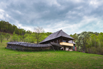 Simple peaceful rural lifestyle, old house in beautiful landscape