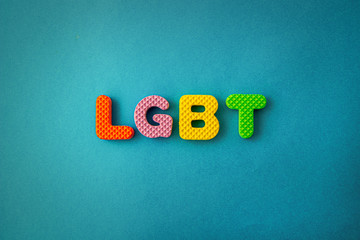 colored letters with word LGBT on green background. Valentines and LGBT concept.