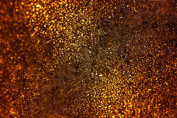 Gold, red  and pink abstract bokeh lights. defocused background.