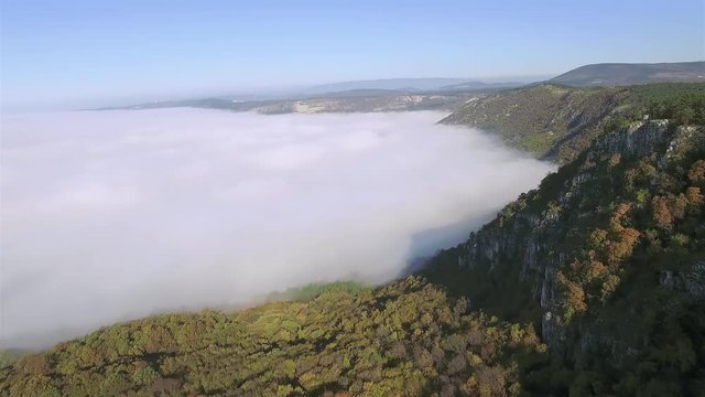 Socerb, Slovenia - November 13, 2015: Border cliffs between Slovenia and Italy and foggy carpet above Trieste.
