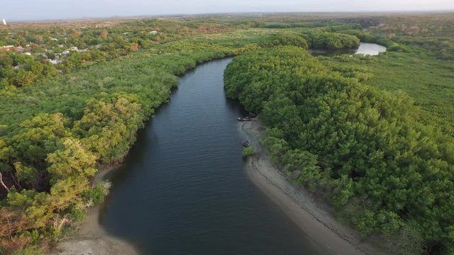Aerial reverse of Dajabón or Massacre river close to Haiti