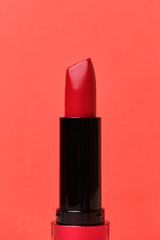 Red lipstick on a red background.