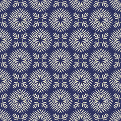 Vector seamless pattern with stylized tropical leaves and flowers