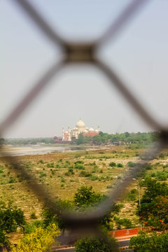 looking to taj mahal through lattice jali from the fort, Agra, U