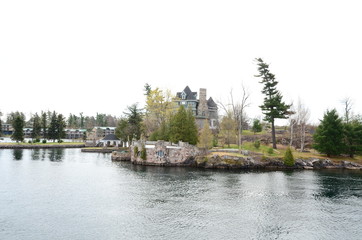 Fototapeta premium One Island in Thousand Islands Region in fall of New York State, USA