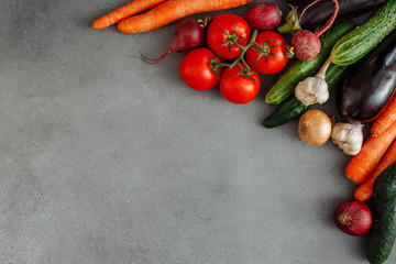 Fototapeta na wymiar Variety of food vegetables products on grey background