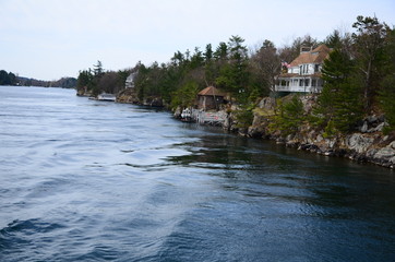 Obraz premium Thousand Islands area of Saint Lawrence River in the board of USA and Canada