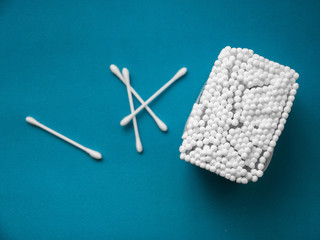 packaging of ear sticks on a blue background. hygiene and care