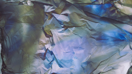 Colorful plastic bag background, photo elasticity technique