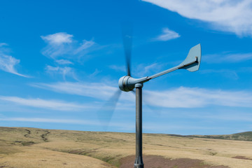 wind turbine on a blue sky