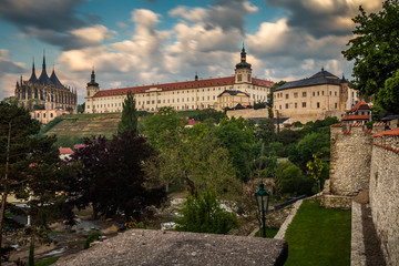 Fototapeta premium Dawn with dramatic sky. Panorama city of kutna Hora. The Cathedral of St Barbara and Jesuit College in Kutna Hora, Czech Republic, Europe. UNESCO World Heritage Site