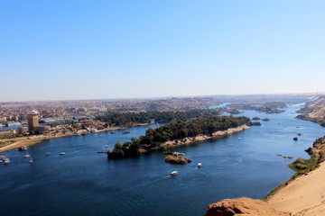 Fototapeta na wymiar Aswan City skyline showing the Nile and boats