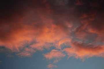 Naklejka na ściany i meble Sunset with clouds in the sky